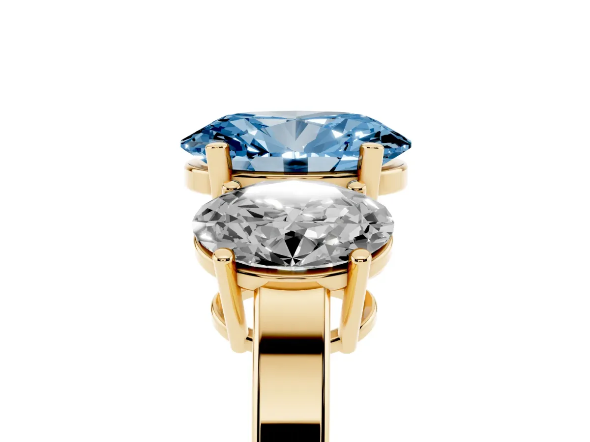 Fancy Blue Three-Stone Oval Cut Cut Diamond Engagement Ring with Flat Band and Four-Prong Setting Yellow gold
