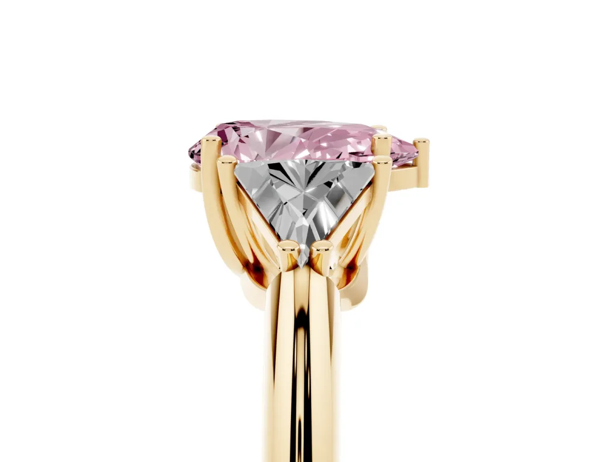 Fancy Pink Three-Stone Pear Cut Diamond Engagement Ring with Trillion Side Stones and Prong Setting Yellow gold