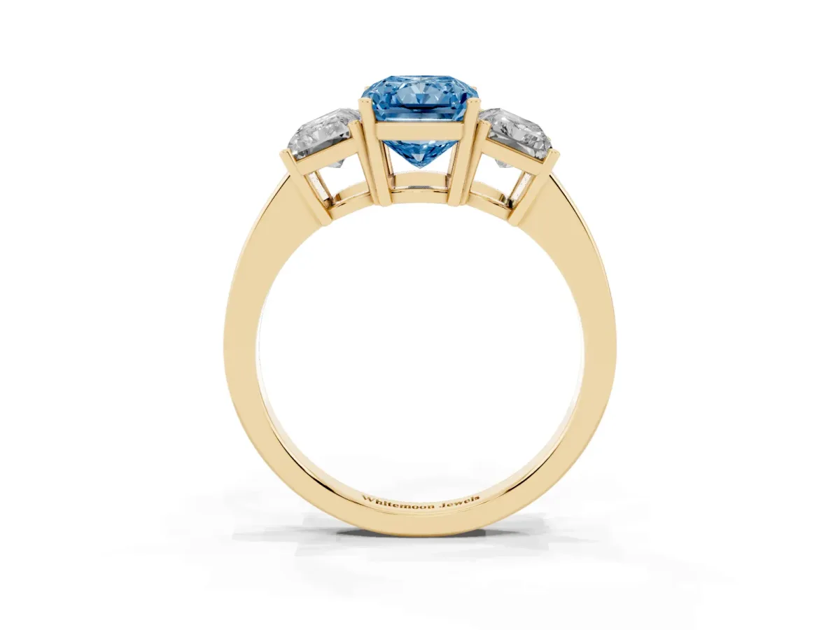 Fancy Blue Three-Stone Radiant Cut Cut Diamond Engagement Ring with Flat Band and Four-Prong Setting Yellow gold