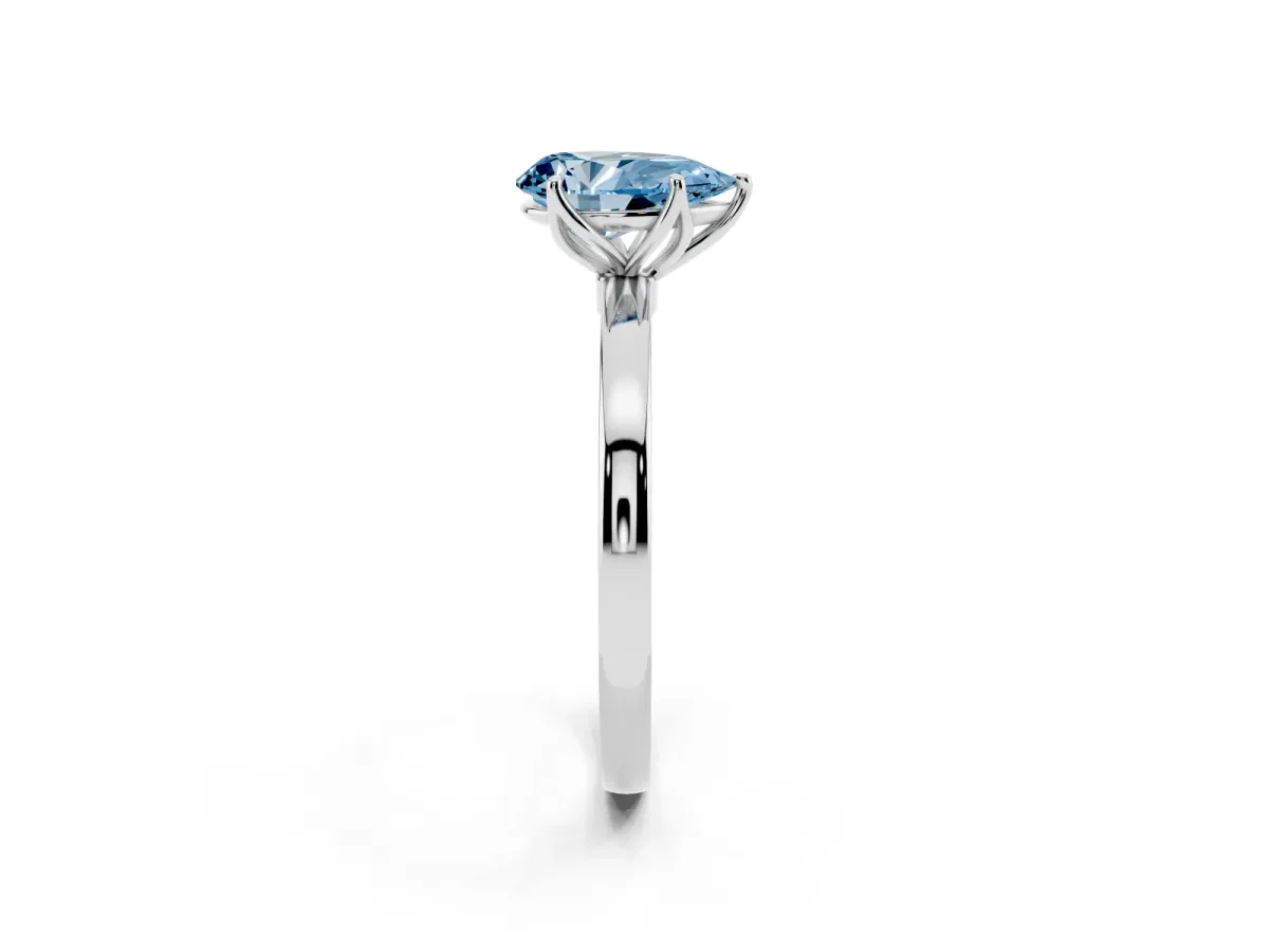 Fancy Blue Pear Cut Diamond Solitaire Ring with Thin Band and Prong Setting Silver