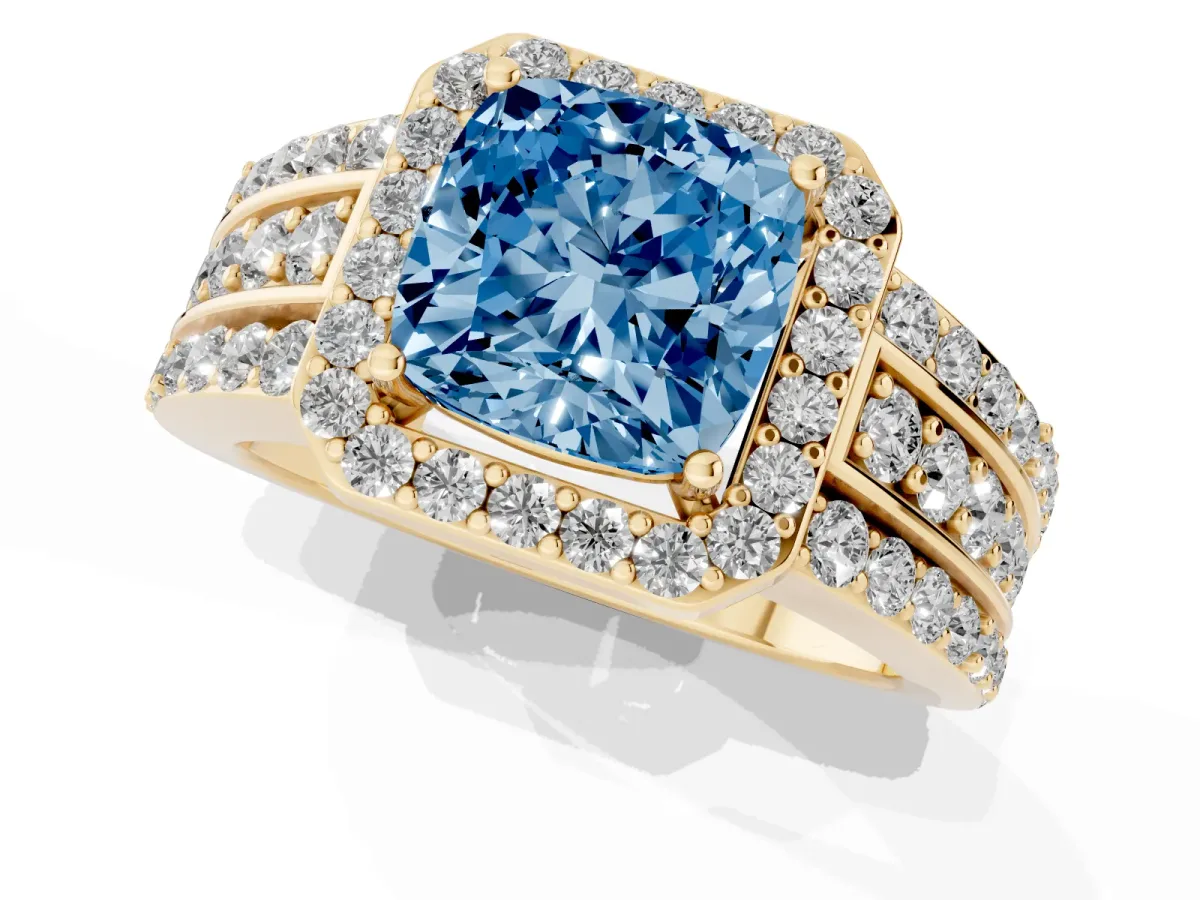 Fancy Blue Cushion Cut Halo Diamond Ring with Round Split Shank and Prong Setting Yellow gold