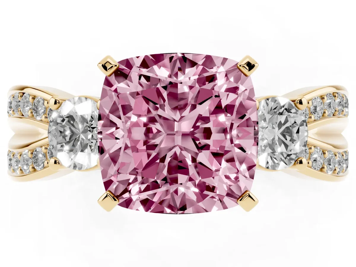Fancy Pink Three-Stone Cushion Cut Cut Diamond Twist Band with Prong Setting Yellow gold