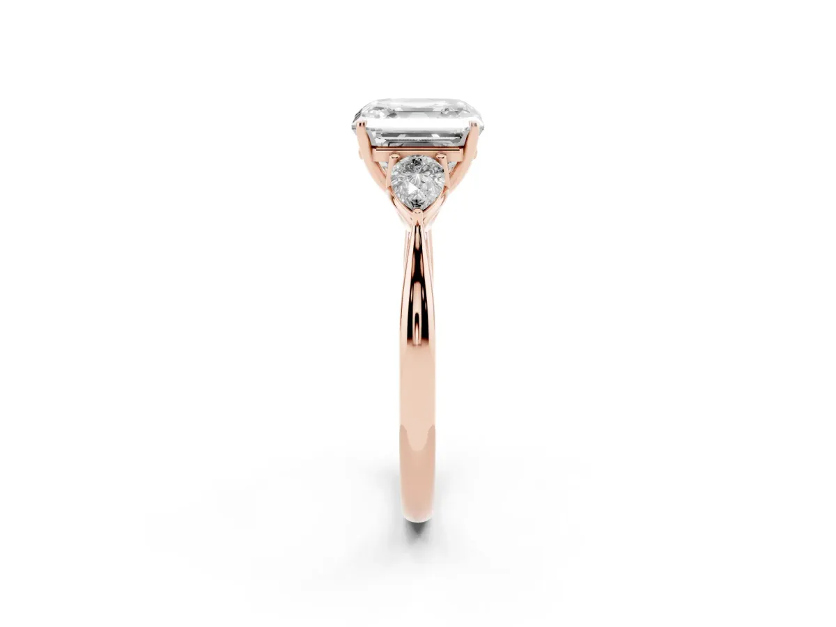 Three-Stone Asscher Cut Diamond Ring with Pear Side Stones in Four-Prong Setting Rose gold