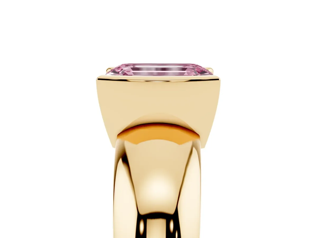 Fancy Pink Emerald Cut Solitaire Tension Set Diamond Ring with Wide Band Yellow gold