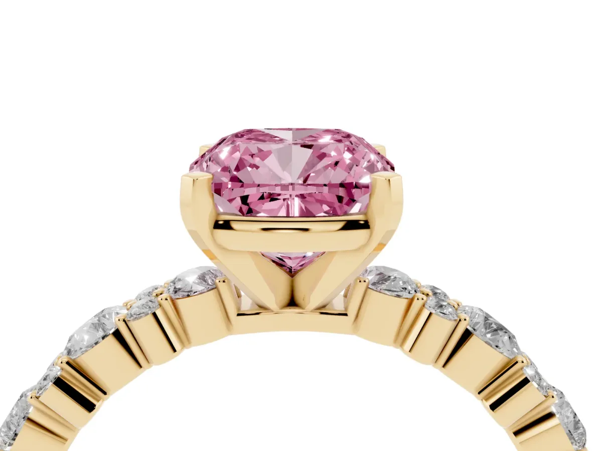 Fancy Pink Cushion Cut Diamond Side Stone Solitaire Ring with Round and Four-Prong Setting Yellow gold
