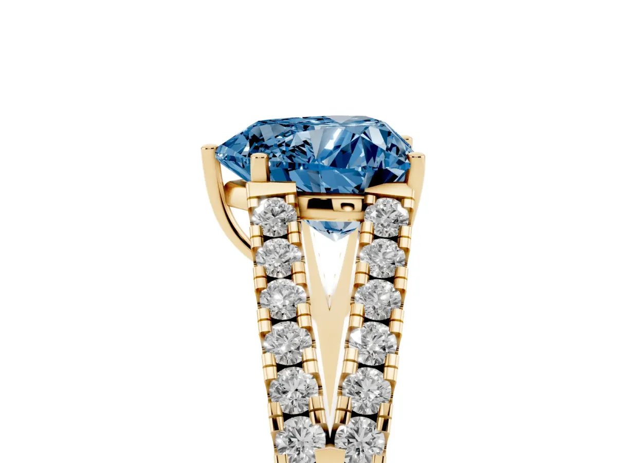 Fancy Blue Heart Cut Diamond Split Shank Engagement Ring with Round Pavé and Prong Setting Yellow gold