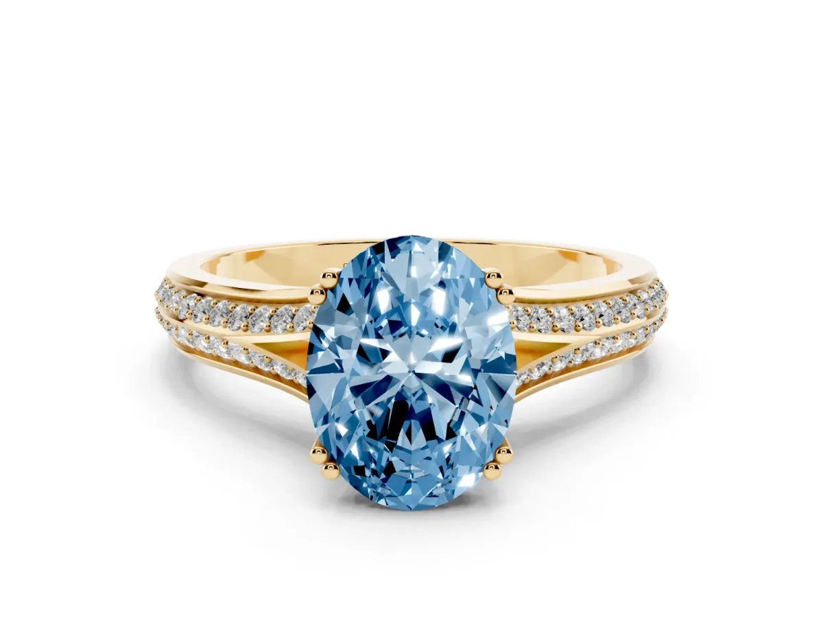 Fancy Blue Oval Cut Diamond Split Shank Engagement Ring with Pavé Band Yellow gold