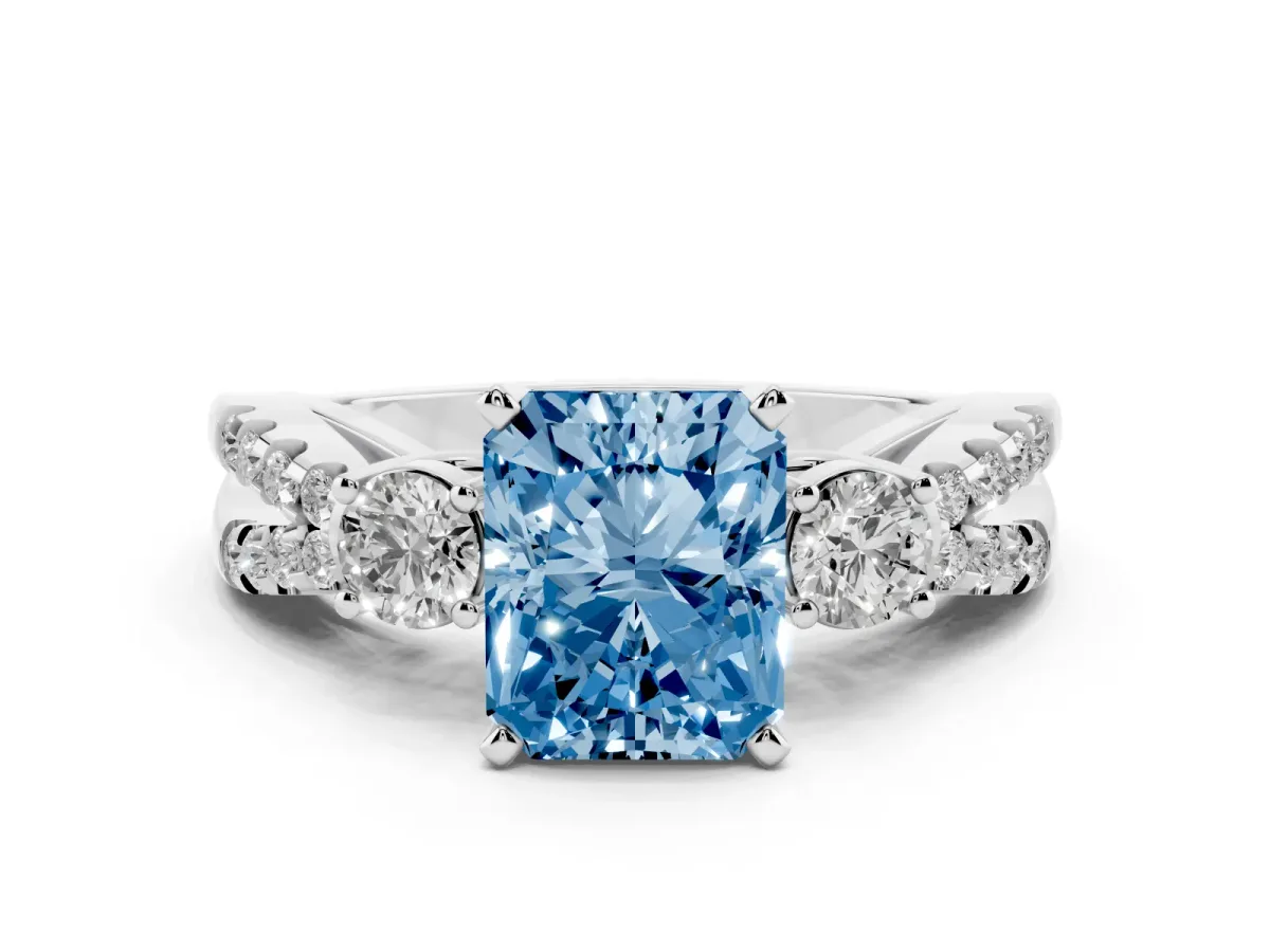 Fancy Blue Radiant Cut Diamond Three-Stone Ring with Pavé Split Shank and Four-Prong Setting White gold