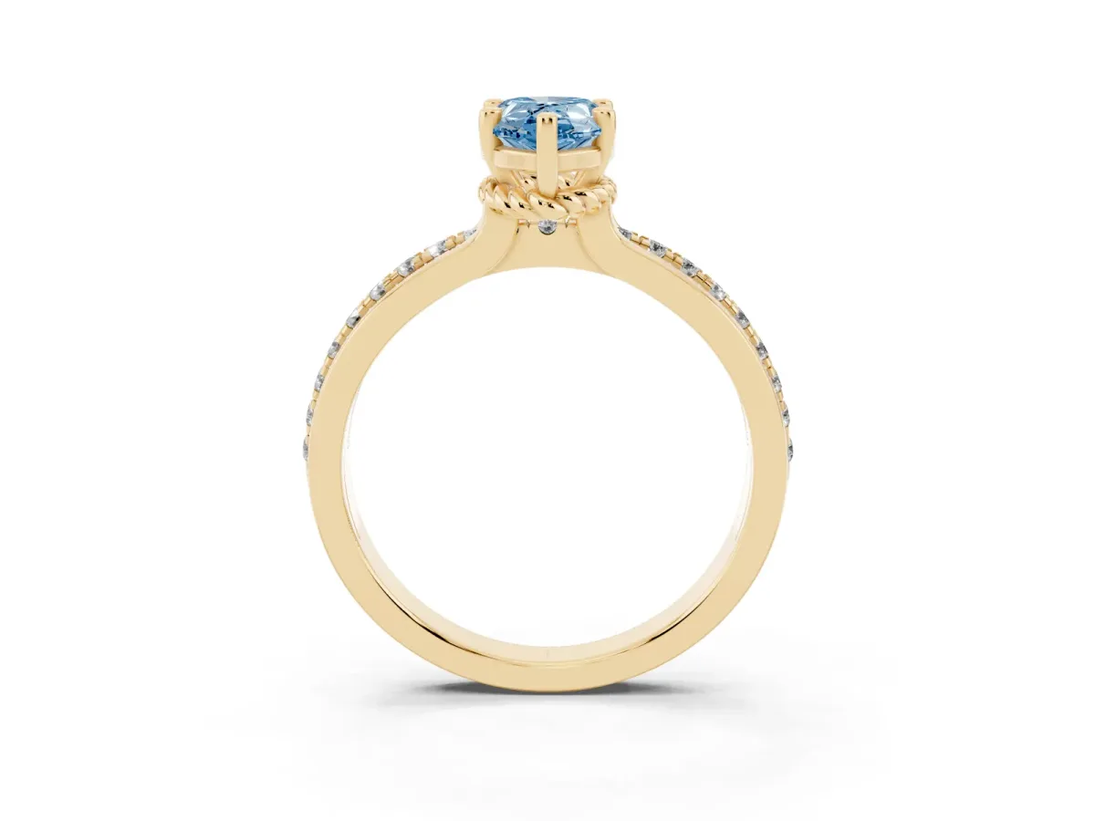 Fancy Blue Pear Cut Solitaire Diamond Ring with Channel Set Band and Six-Prong Setting Yellow gold