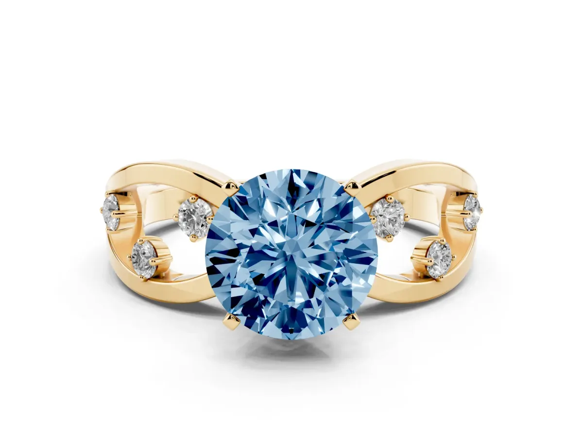 Fancy Blue Round Cut Cut Solitaire Diamond with Side Stones on Criss-Cross Band and Four-Prong Setting Yellow gold