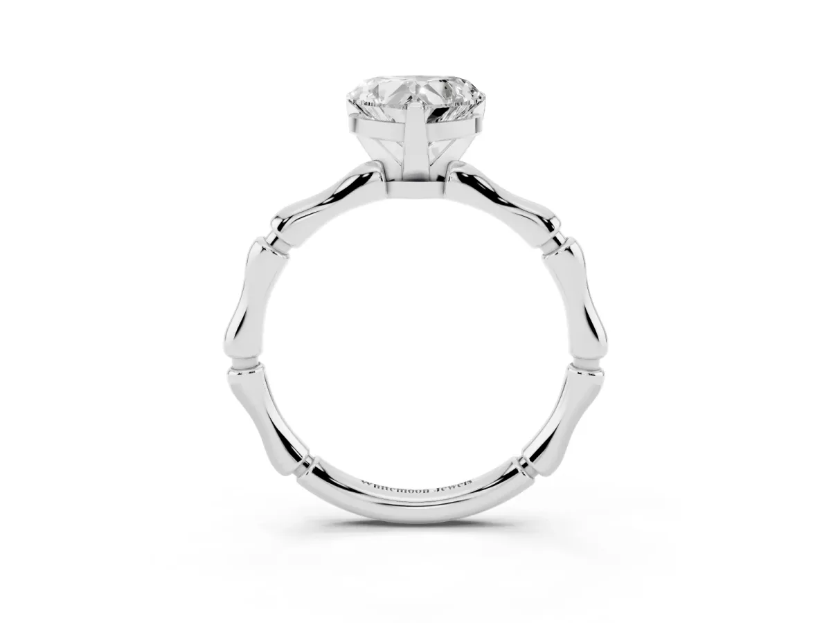 Heart Cut Solitaire Diamond Ring with Bamboo Band and Four-Prong Setting Platinum