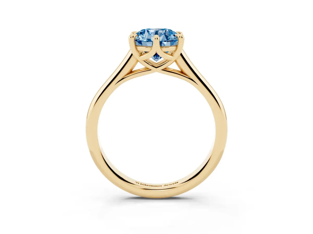 Fancy Blue Round Cut Solitaire Engagement Ring with Six-Prong Setting and Classic Band Yellow gold