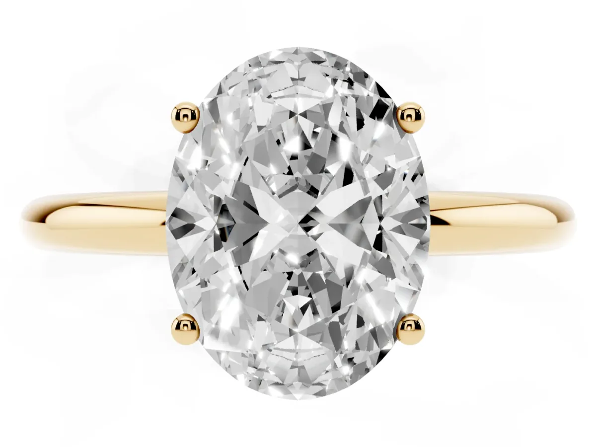 Oval Cut Cut Solitaire Engagement Ring with Four-Prong Setting and Classic Band Yellow gold
