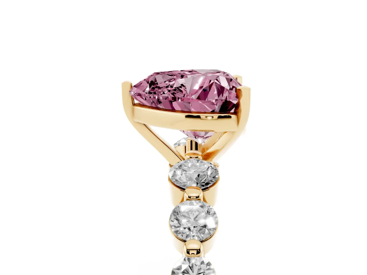 Fancy Pink Heart Cut Solitaire Diamond Ring with Pave Band and Four-Prong Setting Yellow gold