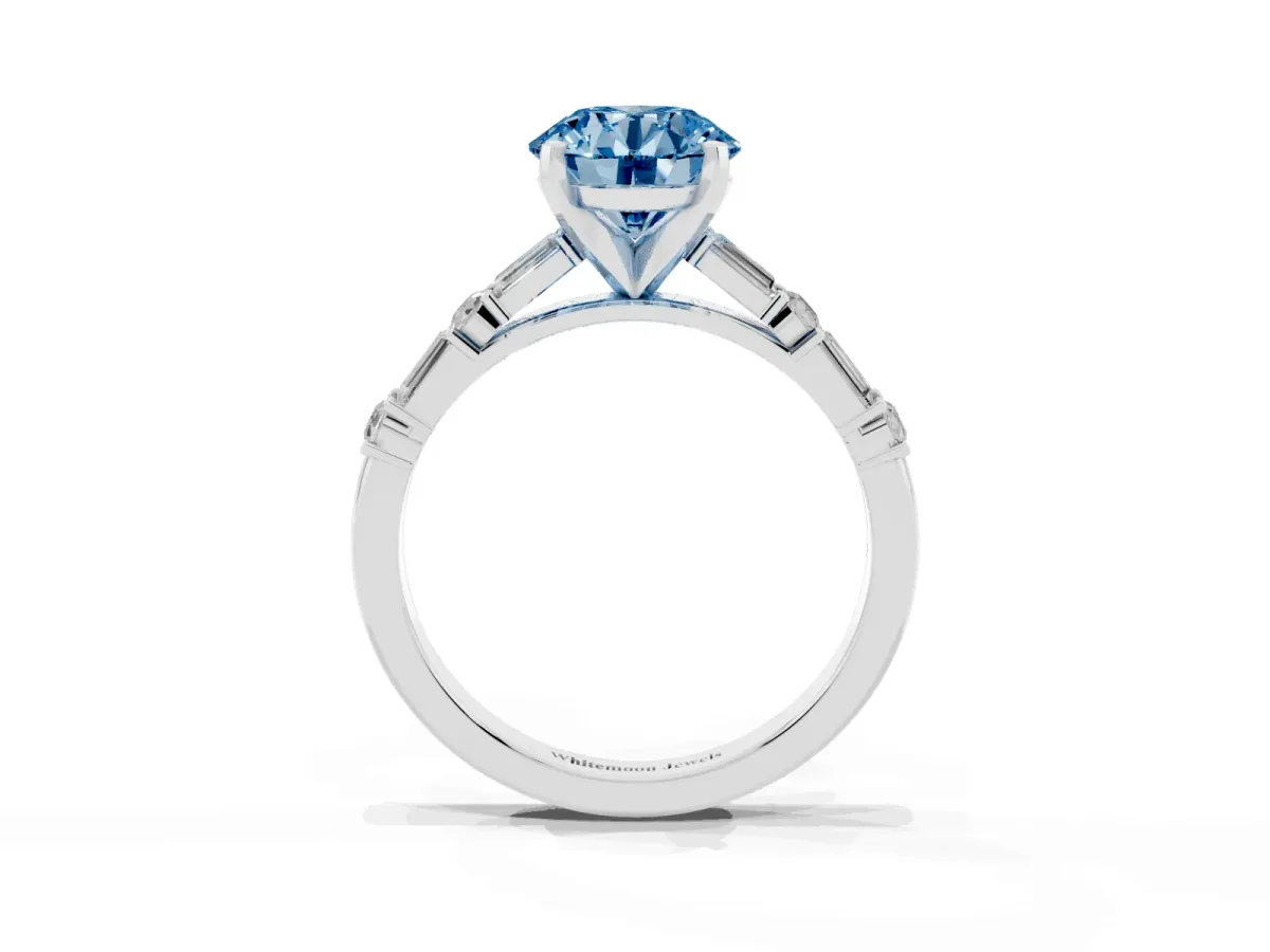 Fancy Blue Round Cut Diamond Solitaire with Side Baguettes and Channel Set Band White gold