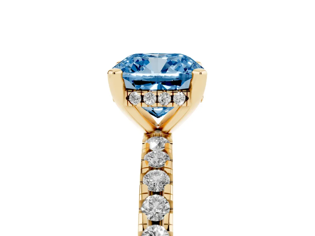 Fancy Blue Cushion Cut Diamond Solitaire Ring with Round Pavé Band and Four-Prong Setting Yellow gold