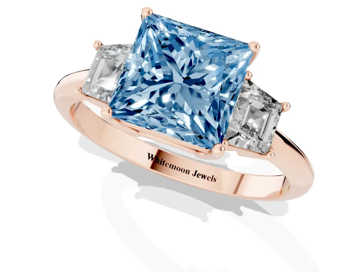 Fancy Blue Princess Cut Diamond Three-Stone Ring with Trapezoid Side Stones and Prong Setting Rose gold