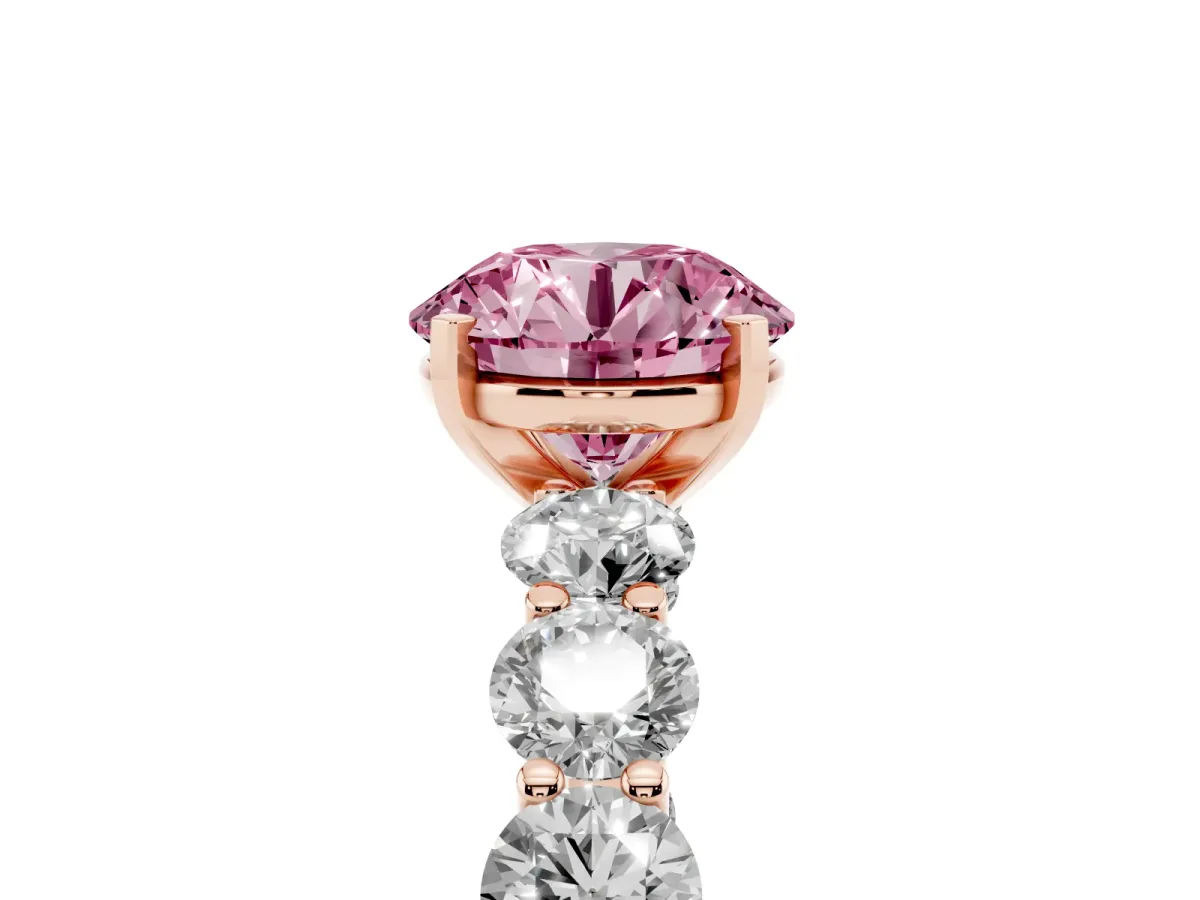 Fancy Pink Round Cut Diamond Prong Setting with Side Stones on a Pave Band Rose gold