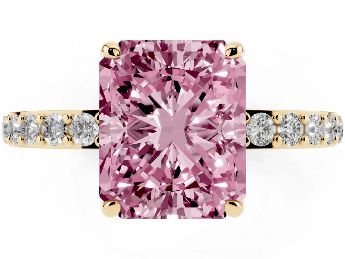 Fancy Pink Radiant Cut Diamond Pavé Engagement Ring with Round Accents and Prong Setting Yellow gold