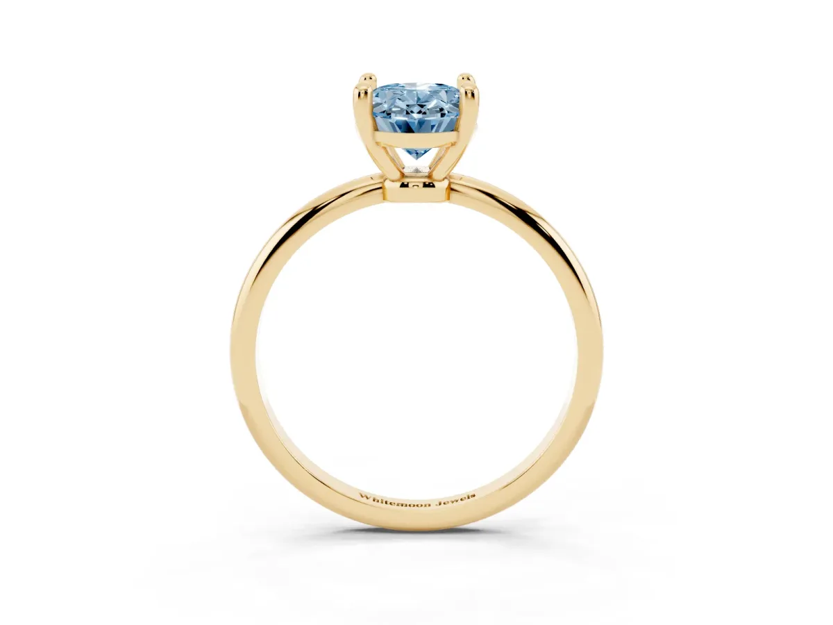 Fancy Blue Oval Cut Solitaire Diamond Ring with 4-Prong Setting on a Classic Band Yellow gold