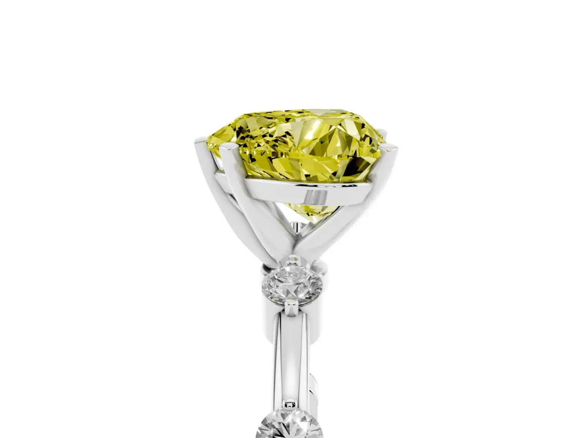 Fancy Yellow Heart Cut Solitaire Diamond Ring with Bezel Set Side Stones and Prong Setting Platinum