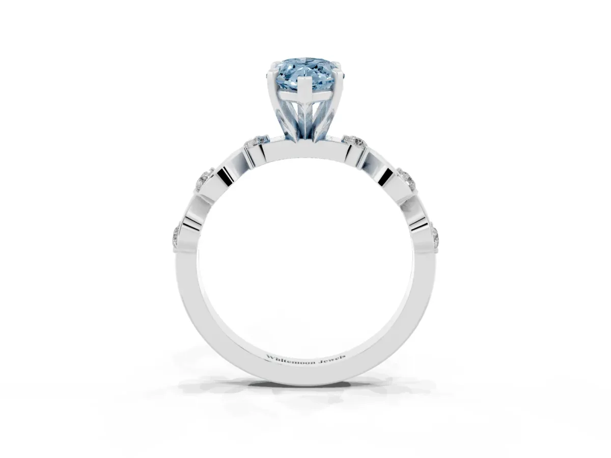 Fancy Blue Marquise Cut Diamond Solitaire Twisted Band with Round Accents and Prong Setting Platinum