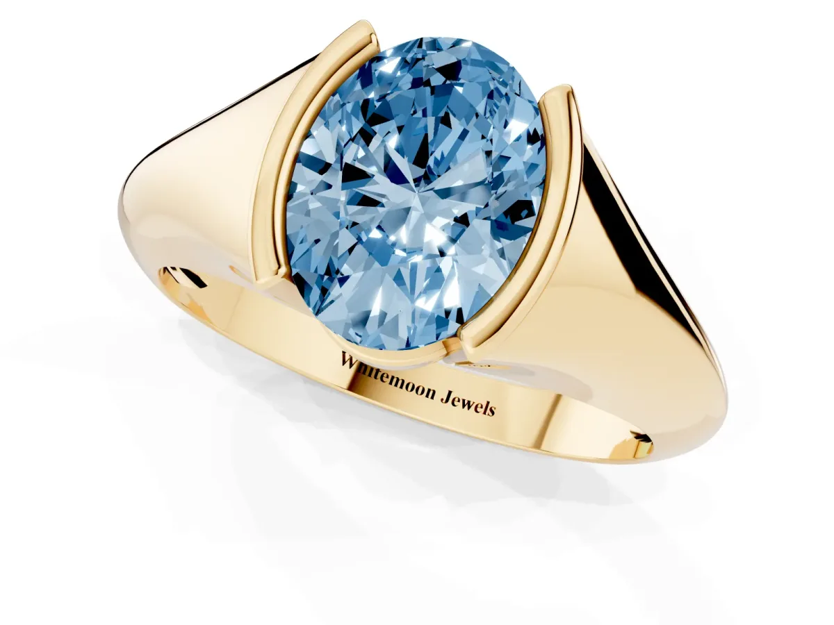 Fancy Blue Oval Cut Solitaire Tension Set Diamond Ring Yellow gold