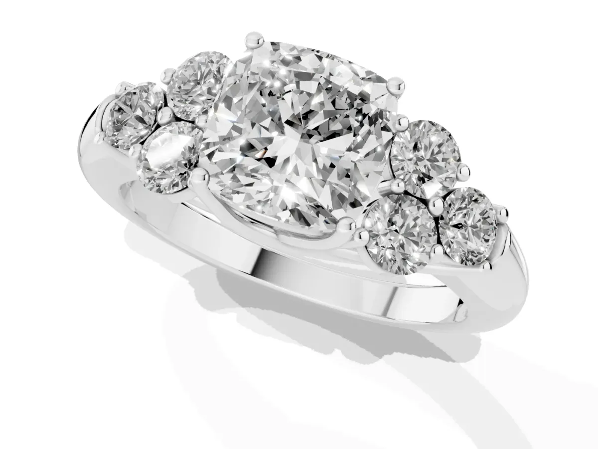 Cushion Cut Cut Diamond Cluster Ring with Round Accent Stones and Prong Setting on a Classic Band Silver