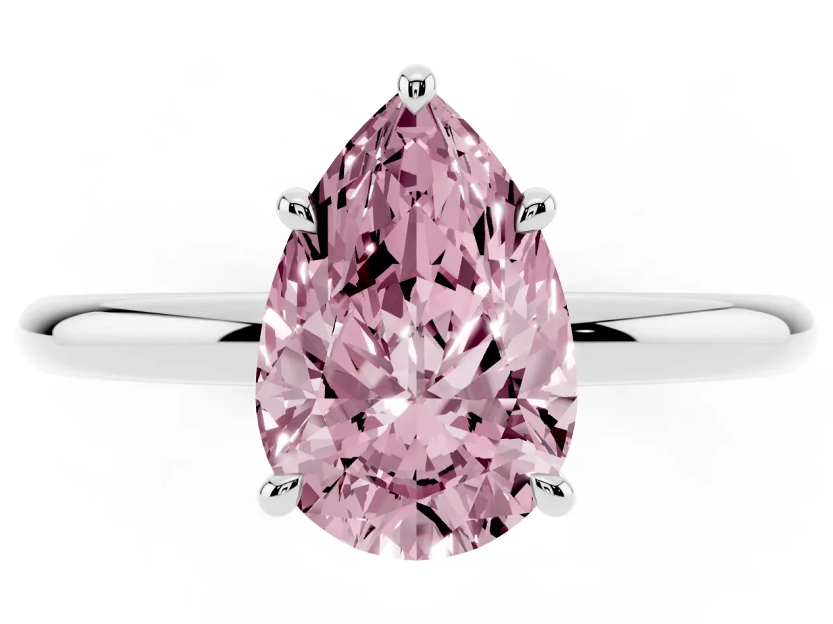 Fancy Pink Pear Cut Diamond Solitaire Ring with Thin Band and Four-Prong Setting Silver