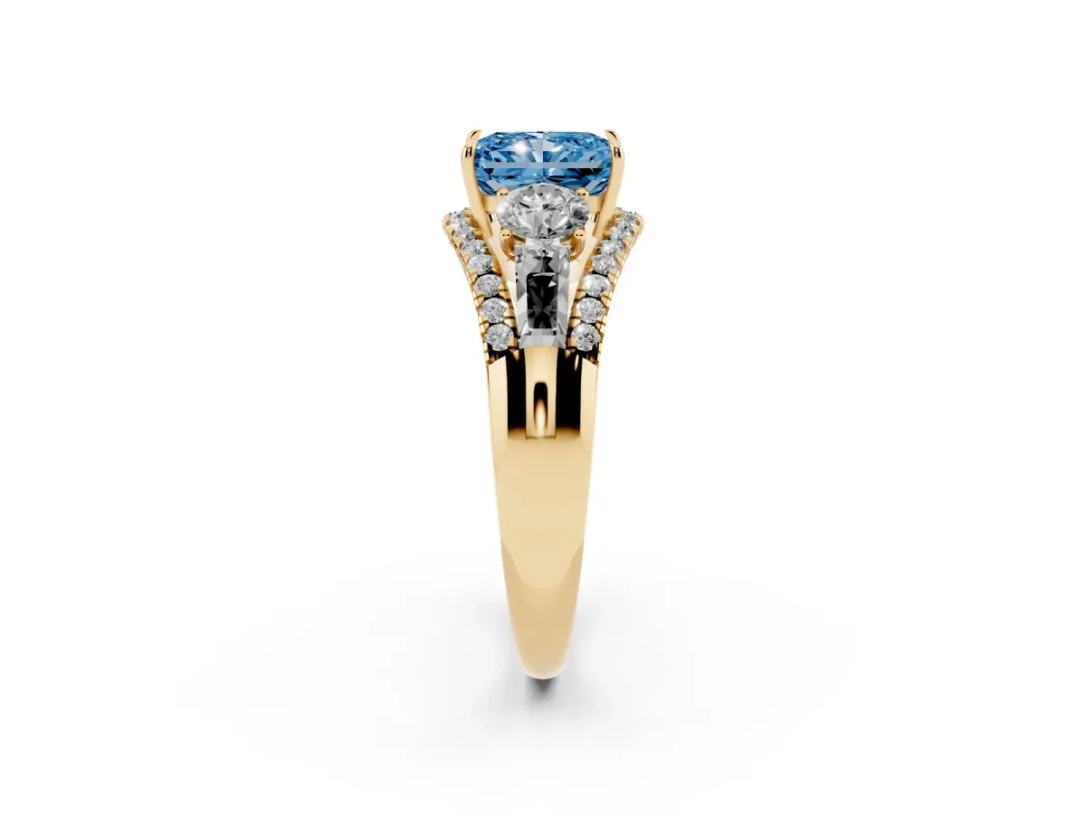 Fancy Blue Three-Stone Radiant Cut Diamond Engagement Ring with Pave Band and Prong Setting Yellow gold