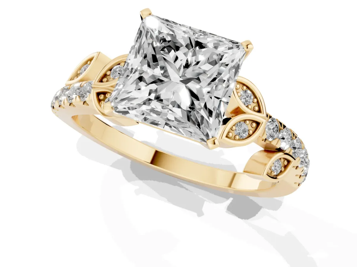 Princess Cut Solitaire Leaf-Inspired Diamond Ring with Pavé Band and Four-Prong Setting Yellow gold