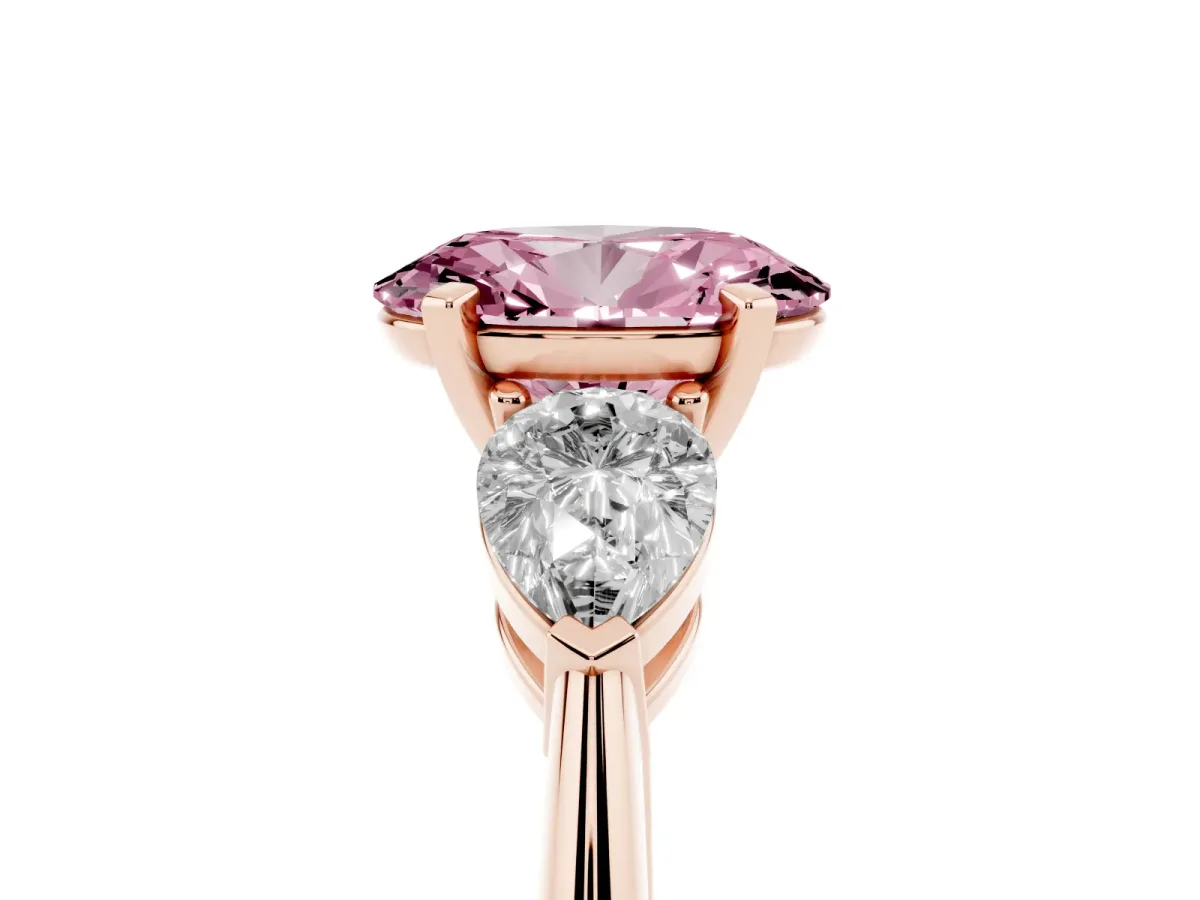 Fancy Pink Three-Stone Oval Cut Diamond Ring with Pear Side Stones and Four-Prong Setting Rose gold