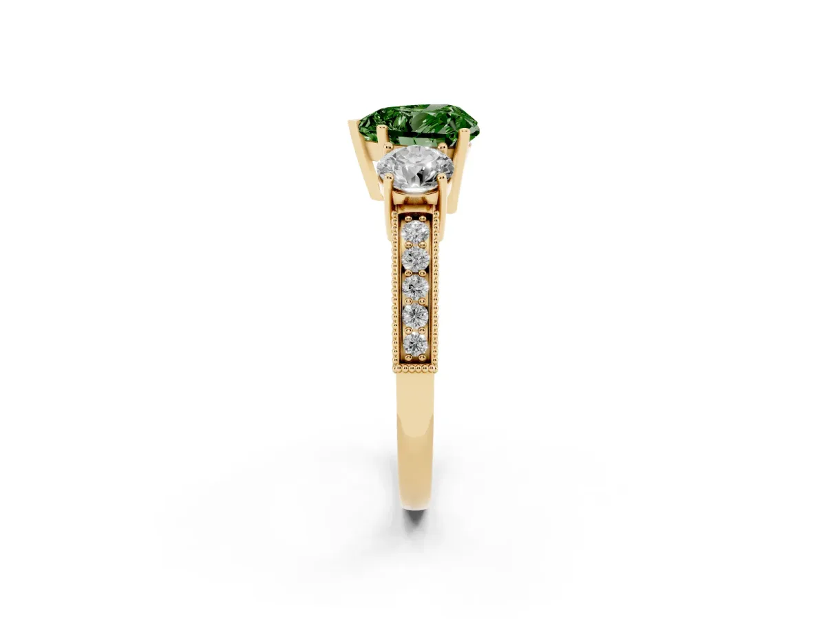 Fancy Green Heart Cut Three-Stone Diamond Ring with Pavé Band and Four-Prong Setting Yellow gold