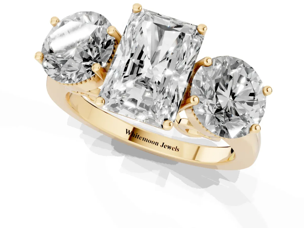 Three-Stone Radiant Cut Diamond Engagement Ring with Prong Setting on a Classic Band Yellow gold