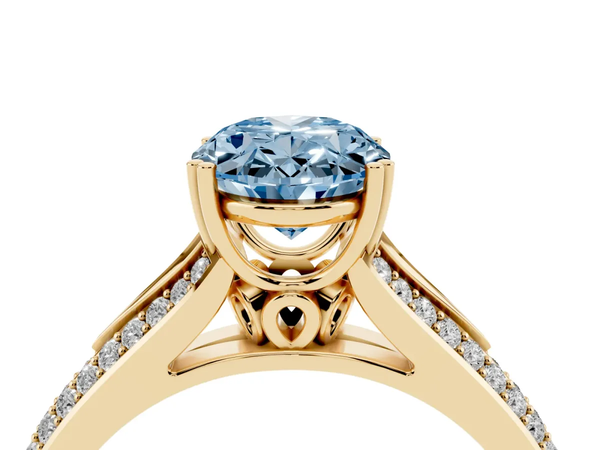 Fancy Blue Oval Cut Diamond Split Shank Engagement Ring with Pavé Band Yellow gold