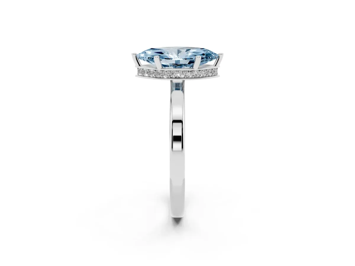 Fancy Blue Marquise Cut Cut Solitaire Engagement Ring with Four-Prong Setting on a Classic Band Silver