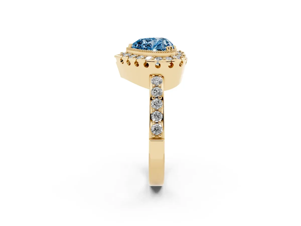 Fancy Blue Heart Cut Diamond Halo Ring with Pavé Band and Prong Setting Yellow gold