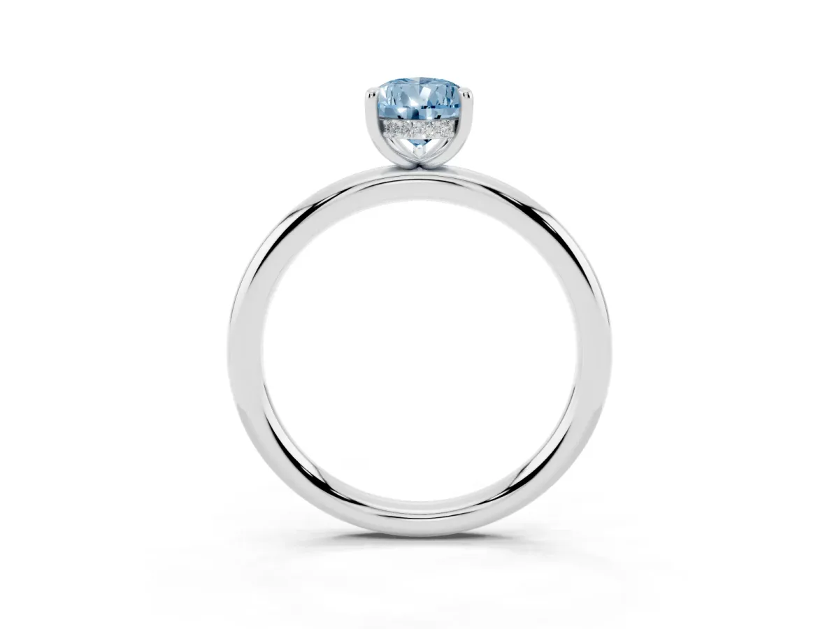 Fancy Blue Pear Cut Diamond Solitaire Ring with Thin Band and Four-Prong Setting Silver