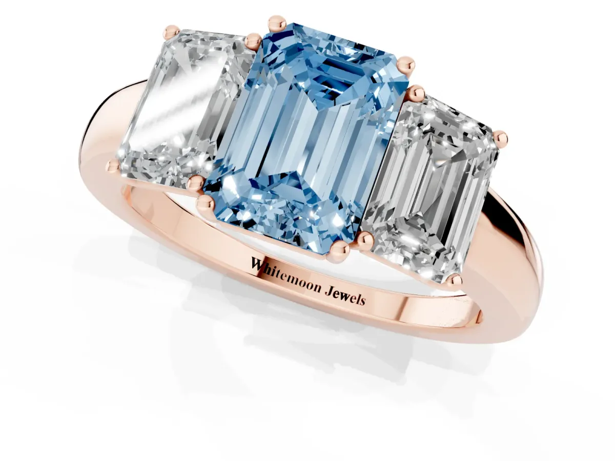 Fancy Blue Emerald Cut Diamond Three-Stone Ring with Four-Prong Setting and Classic Band Rose gold
