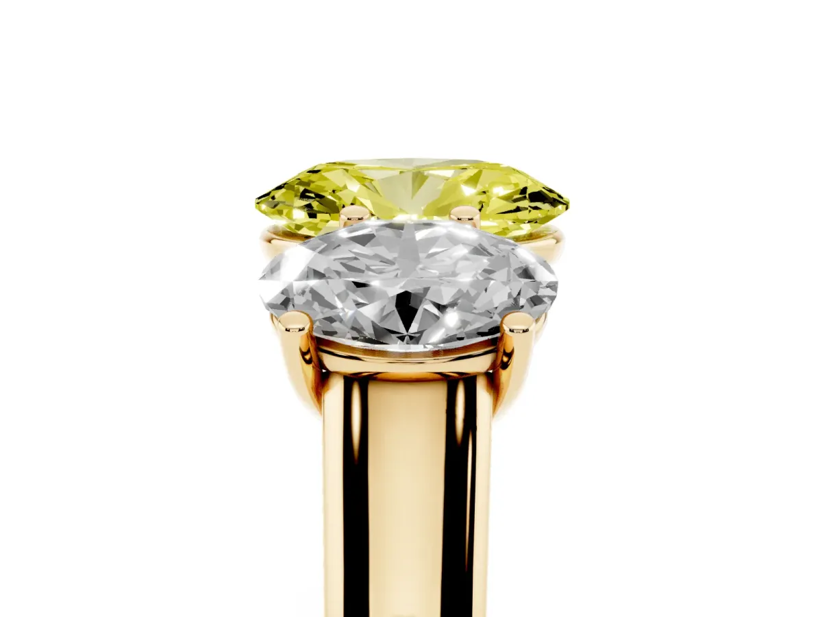 Fancy Yellow Oval Cut Three-Stone Diamond Ring with Prong Setting on a Classic Band Yellow gold