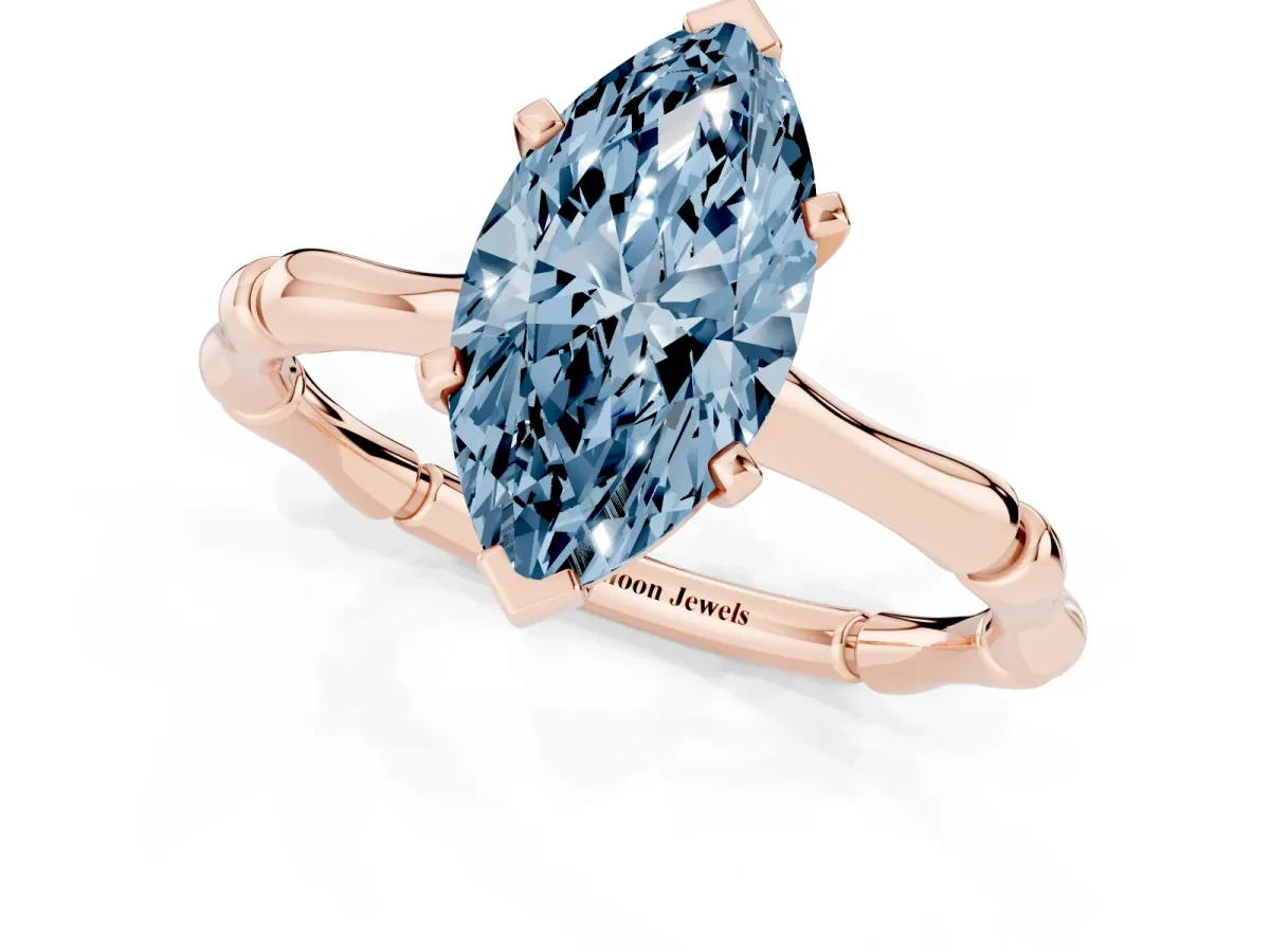 Fancy Blue Marquise Cut Solitaire Diamond Ring with Bamboo Band and Four-Prong Setting Rose gold