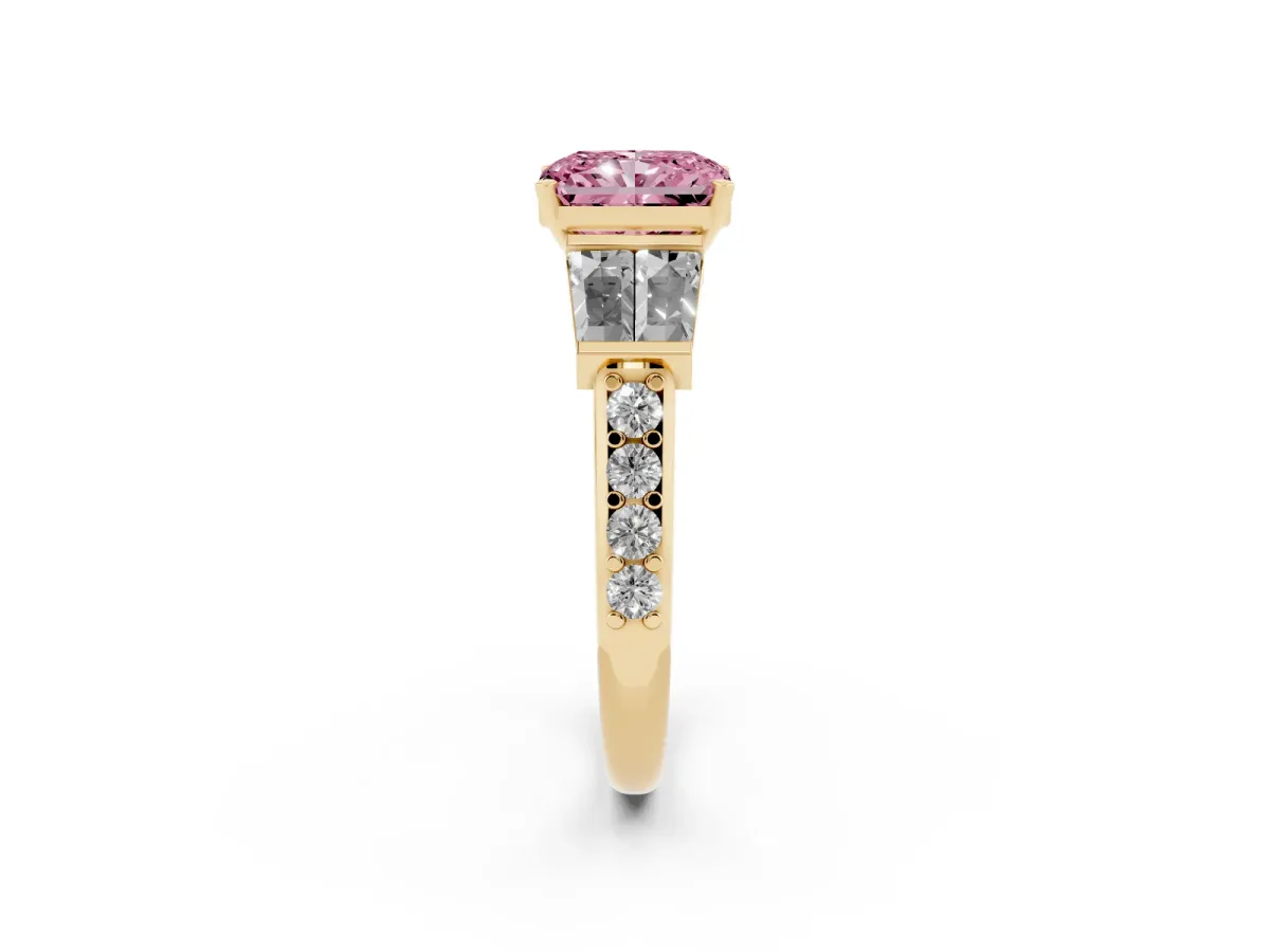 Fancy Pink Radiant Cut Diamond Engagement Ring with Baguette Side Stones and Channel Set Band Yellow gold