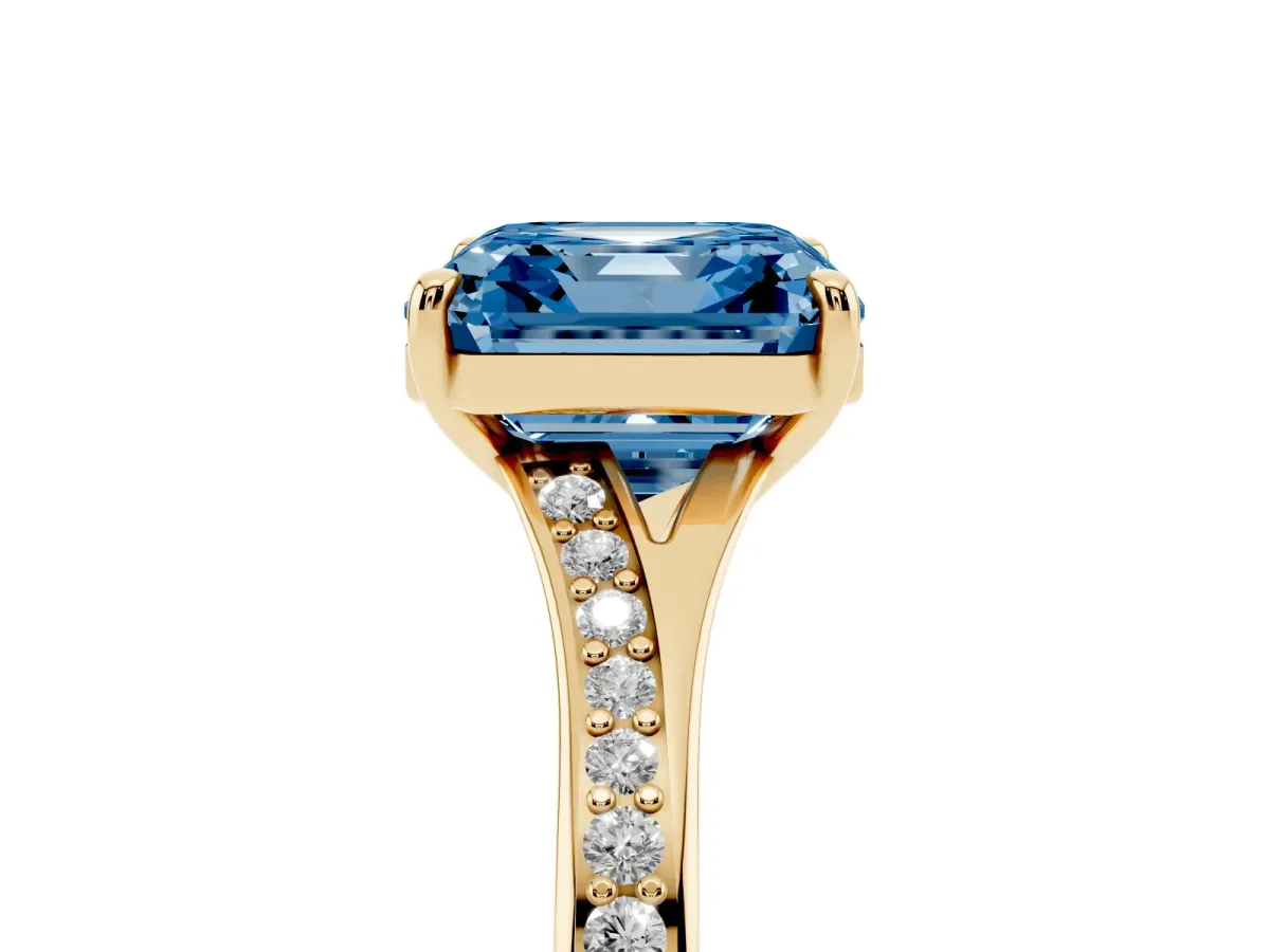 Fancy Blue Asscher Cut Diamond Solitaire Ring with Pavé Band and Prong Setting Yellow gold