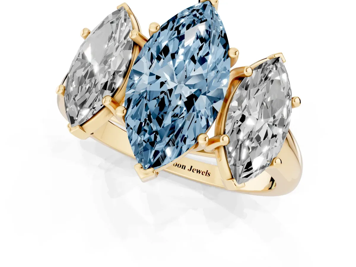 Fancy Blue Three-Stone Marquise Cut Diamond Engagement Ring with Prong Setting Yellow gold