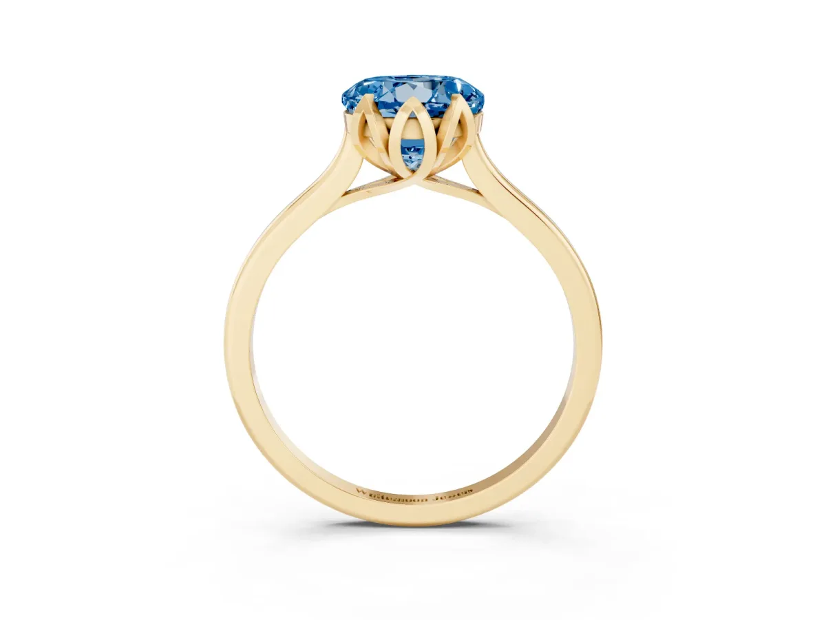 Fancy Blue Round Cut Diamond Solitaire Ring with Flower Prong Setting and Classic Band Yellow gold