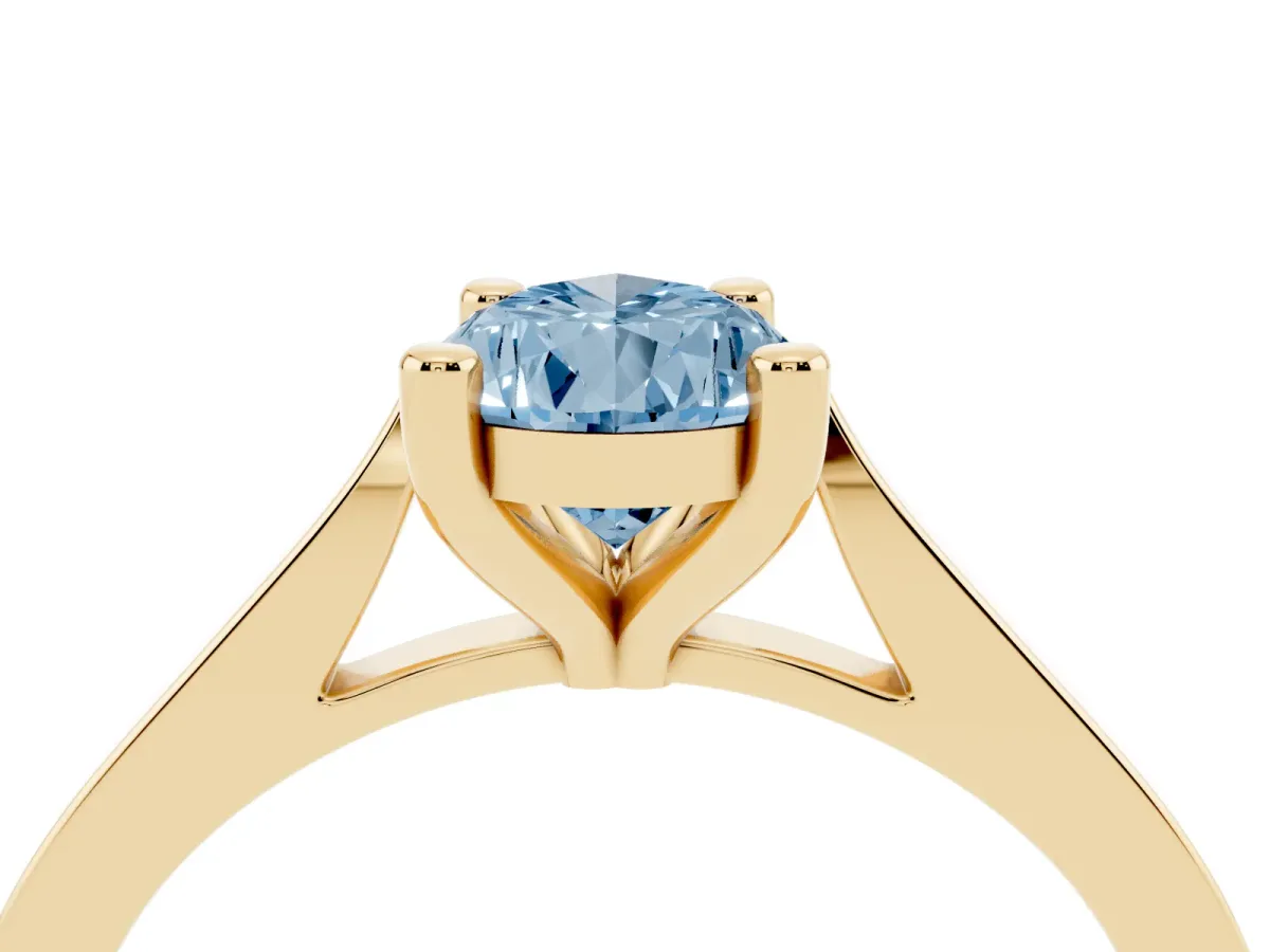 Fancy Blue Pear Cut Solitaire Diamond Ring with Four-Prong Setting and Tapered Band Yellow gold