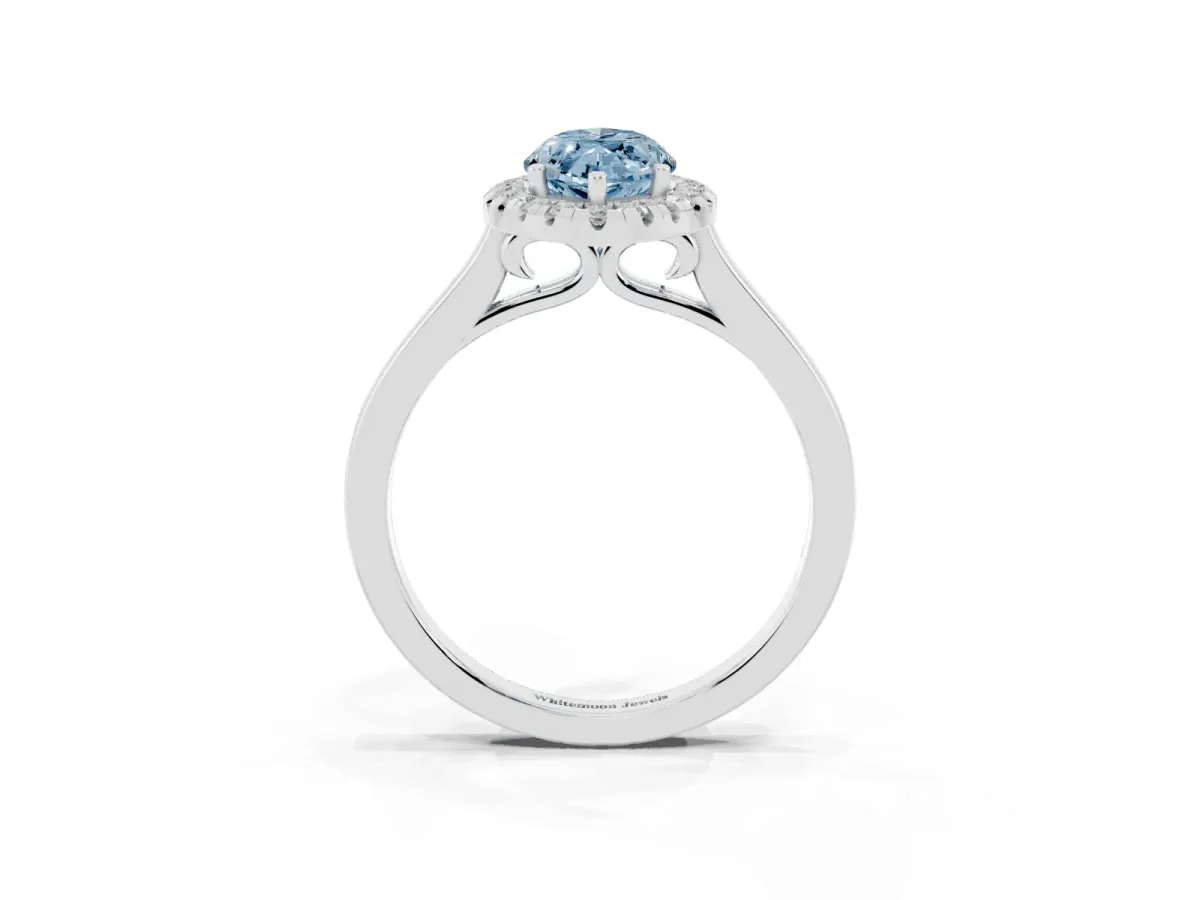 Fancy Blue Marquise Cut Halo Round Diamond Solitaire Ring with Pavé Band and Four-Prong Setting Silver