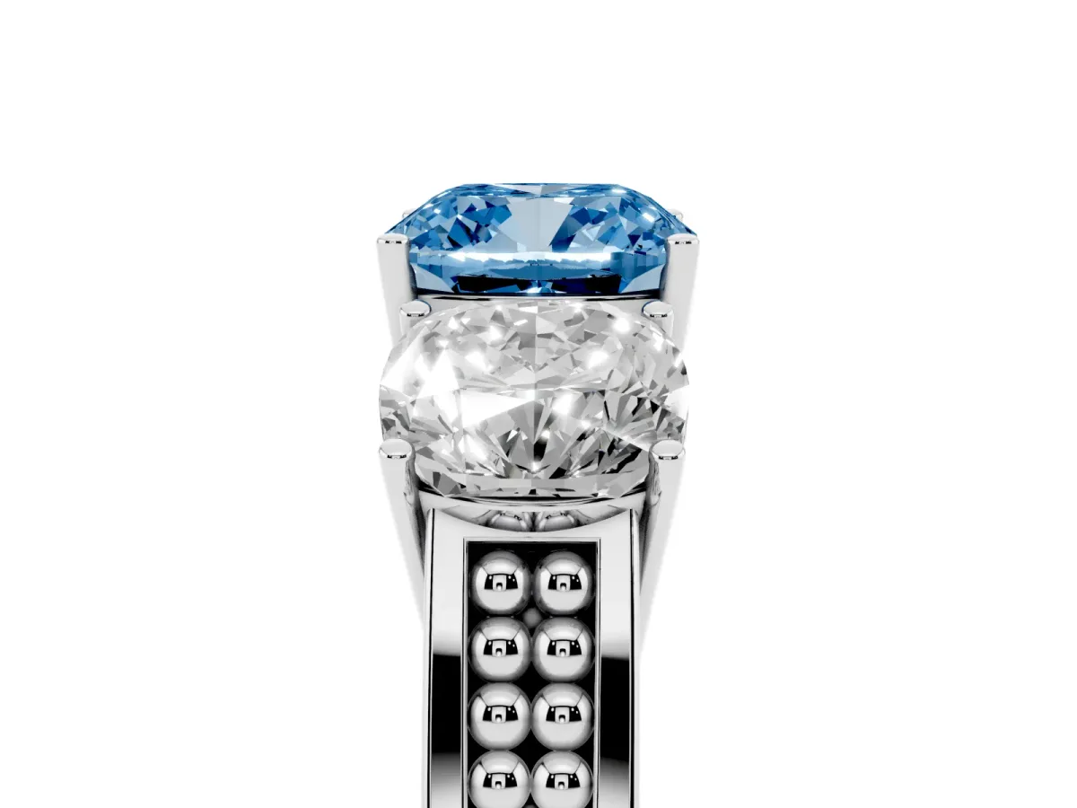 Fancy Blue Cushion Cut Diamond Three-Stone Ring with Prong Setting and Textured Band Platinum
