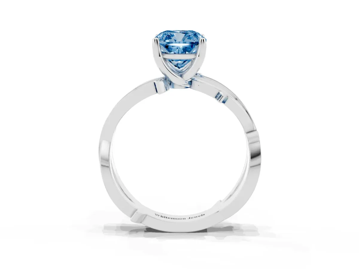 Fancy Blue Cushion Cut Solitaire Twist Band with Pavé Accents and Four-Prong Setting Silver