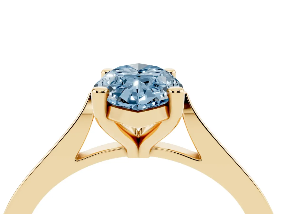 Fancy Blue Marquise Cut Solitaire Diamond Ring with Four-Prong Setting and Tapered Band Yellow gold